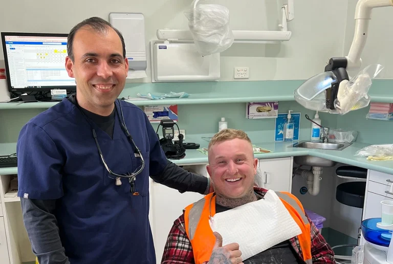 Evening reception at a Geelong dental practice with the lights on after standard business hours